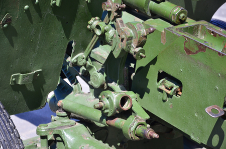 A close-up mechanism of a portable weapon of the Soviet Union of World War II, painted in a dark green colorのeditorial素材