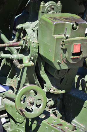 A close-up mechanism of a portable weapon of the Soviet Union of World War II, painted in a dark green colorのeditorial素材