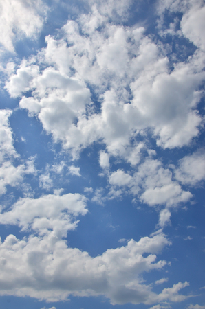 Beautiful blue sky background template with some space for input text message below isolated on blueの写真素材