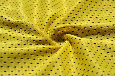 Texture of sportswear made of polyester fiber. Outerwear for sports training has a mesh texture of stretchable nylon fabricの写真素材