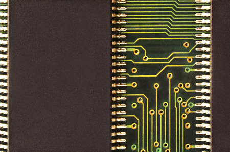 Close up of colored micro circuit board. Abstract technology background. Computer mechanism in detailsの写真素材