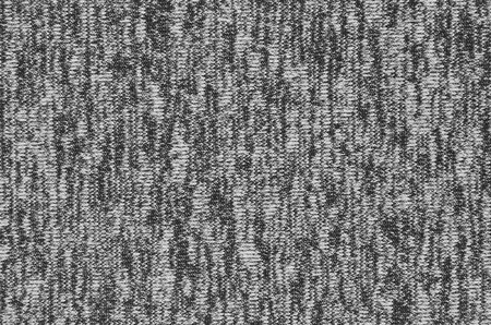 Real heather knitted fabric made of synthetic fibres textured background. Colored fabric texture. Background with delicate striped patternの写真素材