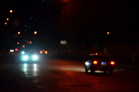 Blurred Defocused Lights of Traffic on a Wet Rainy City Road at Night - Commuting at Rush Hour Concept
Abstract bokeh from car light on the traffic roadの写真素材