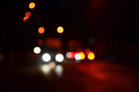 Blurred Defocused Lights of Traffic on a Wet Rainy City Road at Night - Commuting at Rush Hour Concept
Abstract bokeh from car light on the traffic roadの写真素材
