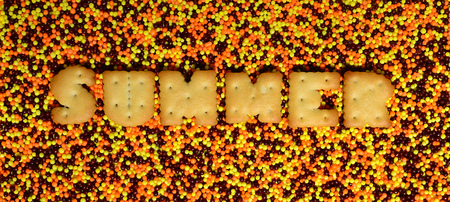 Summer. The word from the edible cracker letters lies on the glazed powder. A huge number of sweet, colorful 
beads of very small size for decoration of pastry products の写真素材