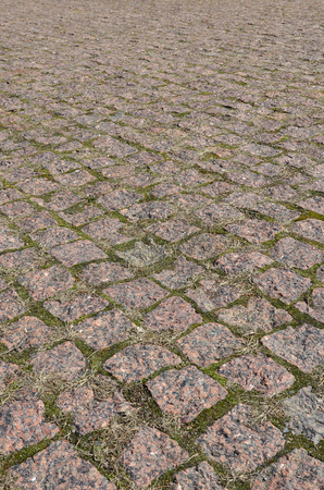 Cobbles texture - hard pavement, a kind of pavement, laid out by flat rectangular (or other shape) bars of approximately the same shape and sizeの写真素材