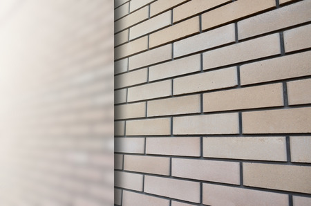 Detailed picture of a quality and ideally smooth brickwork in perspective with a free field for...