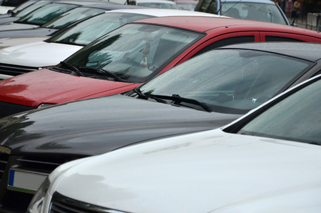 Roofs of several cars. A lot of cars stand close at rush hourの写真素材