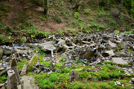 A strange composition of small mountain rocks. imitation of ancient buildings on a reduced scaleの写真素材