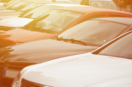 Roofs of several cars. A lot of cars stand close at rush hourの写真素材