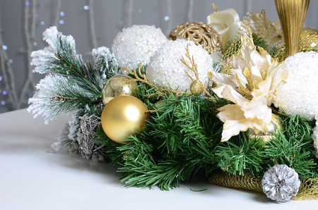 Christmas decorations and toys lie on the surface of a white grand piano. Christmas still lifeの写真素材