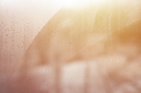 Window glass with condensate or steam after heavy rain, Texture or background imageの写真素材