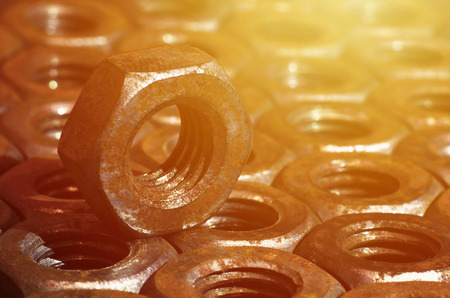 Closeup of a pile of rusty nuts. Retro industrial conceptの写真素材