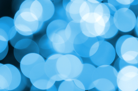 Blue Festive Christmas elegant abstract background with many bokeh lights. Defocused artistic imageの写真素材