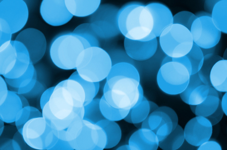 Blue Festive Christmas elegant abstract background with many bokeh lights. Defocused artistic imageの写真素材