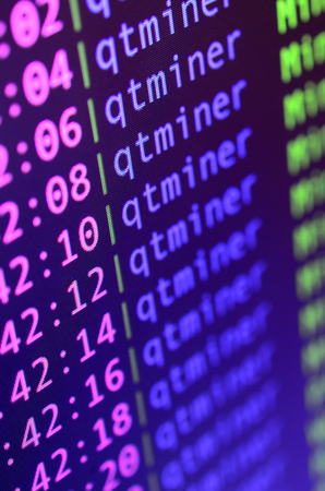 Macro snapshot of the program interface for crypto currency mining on the monitor of an office...