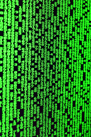 Macro of password selection on the monitor of the office computer. The concept of hacking the protection of a personal data keeper. The stream of supposed digital passwords of four and five digitsの写真素材