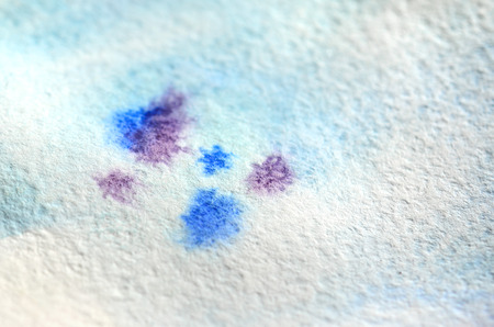 Abstract background illustration in the form of watercolor brush strokes and blue streams. Macro photo of watercolor pictureの写真素材