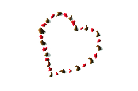 Image of a heart made from wet drops of watercolor paint, isolated on whiteの写真素材