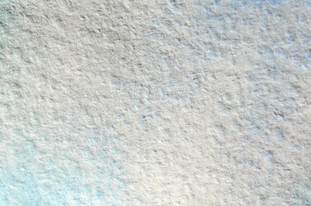 Texture of thick paper intended for watercolor painting. Macro snapshot of details of the relief paper structureの写真素材