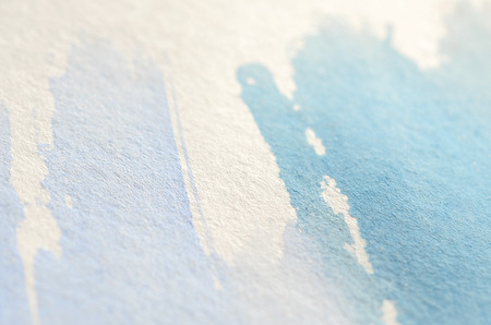 Abstract background illustration in the form of three watercolor strokes performed in cold blue and violet tonesの写真素材