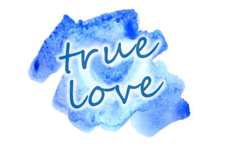 True love. The text is depicted in Watercolor illustration in the form of a wet color stroke, inside which is a painted heartの写真素材