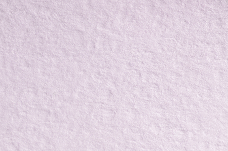 Texture of thick paper intended for watercolor painting. Macro snapshot of details of the relief paper structureの写真素材