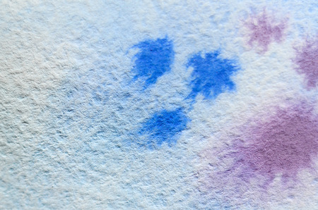 Abstract background illustration in the form of watercolor brush strokes and blue streams. Macro photo of watercolor pictureの写真素材