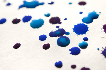 Abstract background illustration in the form of watercolor drops of blue color. Macro picture of a wet watercolor pictureの写真素材