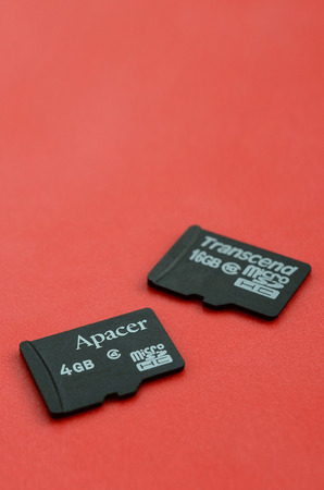 KHARKOV, UKRAINE - DECEMBER 29, 2017: Two small micro SD memory cards Apacer 4gb and Transcend 16gb...