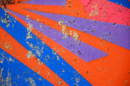 Texture of a fragment of the wall with graffiti painting, which is depicted on it. An image of a piece of graffiti drawing as a photo on street art and graffiti culture topicsの写真素材
