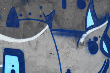 Background image of a concrete wall with a piece of abstract graffiti pattern. Street art, vandalism and youth hobbiesの写真素材