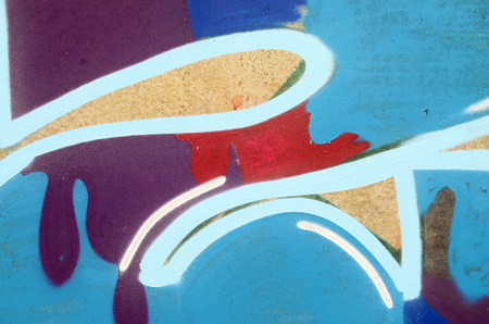 Background image with a graffiti pattern, which is applied to a concrete wall with aerosol paintsの写真素材
