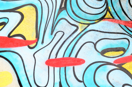 Background image with a graffiti pattern, which is applied to a concrete wall with aerosol paintsの写真素材