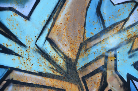 The old wall, painted in color graffiti drawing with aerosol paints. Background image on the theme of drawing graffiti and street artの写真素材