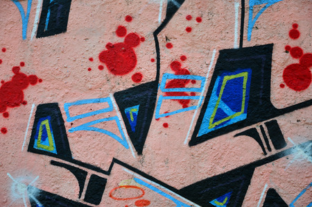 Street art. Colorful graffiti on the wall. Fragment for background. Abstract detail of a graffitiの写真素材