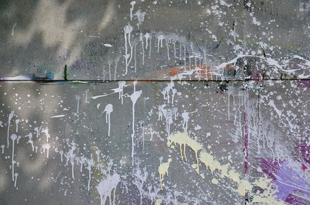 Street art. Colorful graffiti on the wall. Fragment for background. Abstract detail of a graffitiの写真素材
