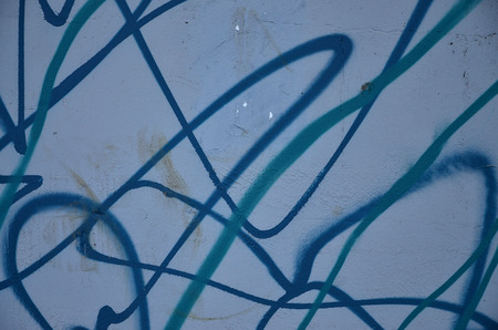 Art under ground. Beautiful street art graffiti style. The wall is decorated with abstract drawings house paint. Modern iconic urban culture of street youth. Abstract stylish picture on wallの写真素材