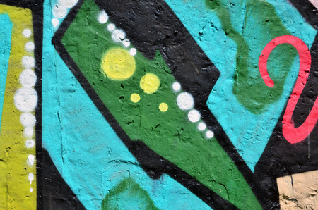 Background image of the wall decorated with colorful abstract graffiti. Street art conceptの写真素材