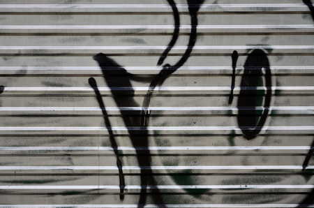 Beautiful street art graffiti. Abstract color creative drawing fashion colors on the walls of the city. Urban Contemporary Culture. Title paint on walls. Culture youth protestの写真素材