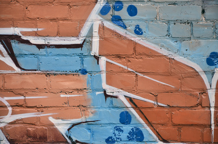 Street art. Colorful graffiti on the wall. Fragment for background. Abstract detail of a graffitiの写真素材
