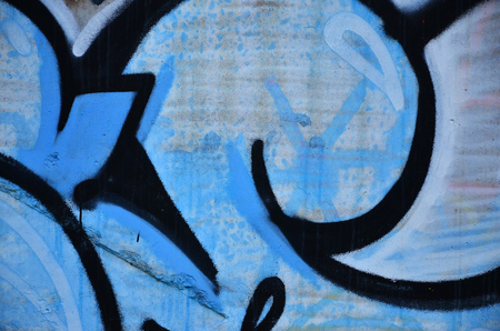 Art under ground. Beautiful street art graffiti style. The wall is decorated with abstract drawings house paint. Modern iconic urban culture of street youth. Abstract stylish picture on wallの写真素材