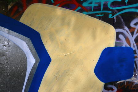 Background image of the wall decorated with colorful abstract graffiti. Street art conceptの写真素材