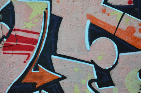 Street art. Colorful graffiti on the wall. Fragment for background. Abstract detail of a graffitiの写真素材
