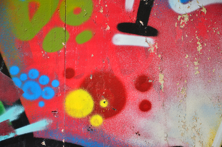 Street art. Colorful graffiti on the wall. Fragment for background. Abstract detail of a graffitiの写真素材