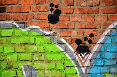 Background image of the wall decorated with colorful abstract graffiti. Street art conceptの写真素材