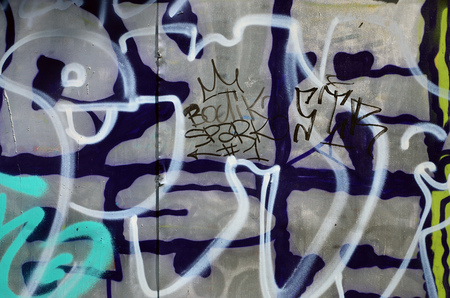 Art under ground. Beautiful street art graffiti style. The wall is decorated with abstract drawings house paint. Modern iconic urban culture of street youth. Abstract stylish picture on wallの写真素材