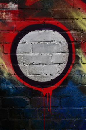 Background image of the wall decorated with colorful abstract graffiti. Street art conceptの写真素材
