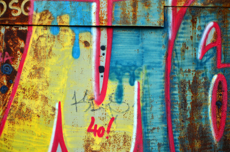 Art under ground. Beautiful street art graffiti style. The wall is decorated with abstract drawings house paint. Modern iconic urban culture of street youth. Abstract stylish picture on wallの写真素材