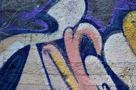 Art under ground. Beautiful street art graffiti style. The wall is decorated with abstract drawings house paint. Modern iconic urban culture of street youth. Abstract stylish picture on wallの写真素材